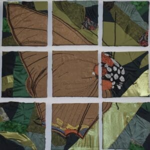 Fabric patchwork butterfly artwork.