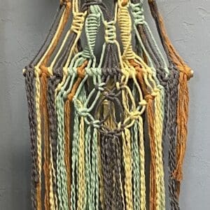 Macrame wall hanging with butterfly.