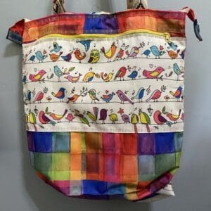 Colorful tote bag with singing birds.