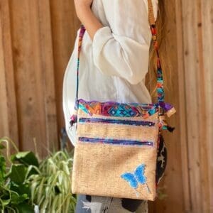 A woman is holding onto some kind of bag