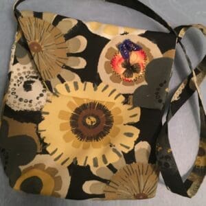 A bag with many different flowers on it