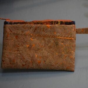 A close up of a cork purse