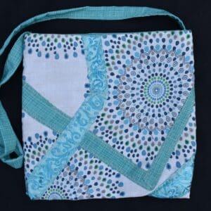 A bag with blue and white designs on it.