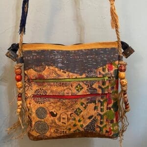 A bag with many different colored fabric on it