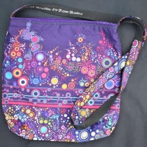 A purple bag with flowers on it