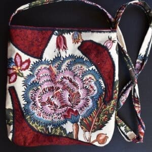 A bag with a floral design on it.