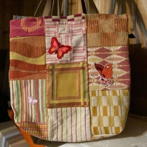 A bag with many different colored squares and patches.