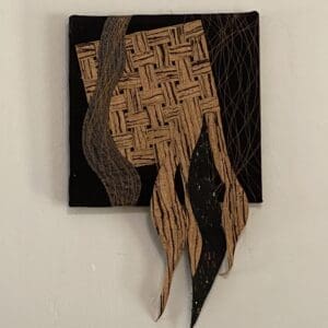 Abstract woven textile art piece.